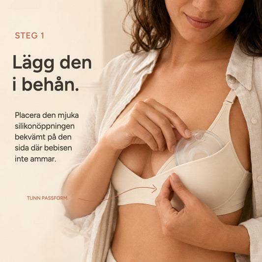 Hand slipping a Relievoo breast milk collector into a nursing bra on the side baby is not feeding from rvpumpen rvhasar