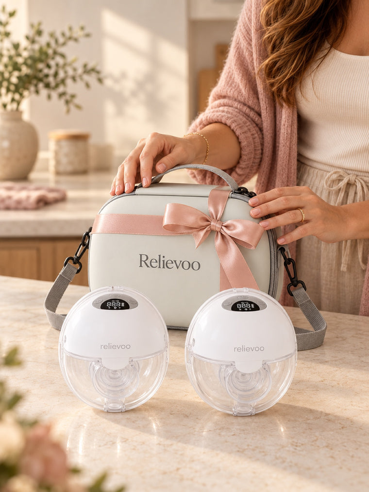 Mum with her baby and the Relievoo wearable breast pump