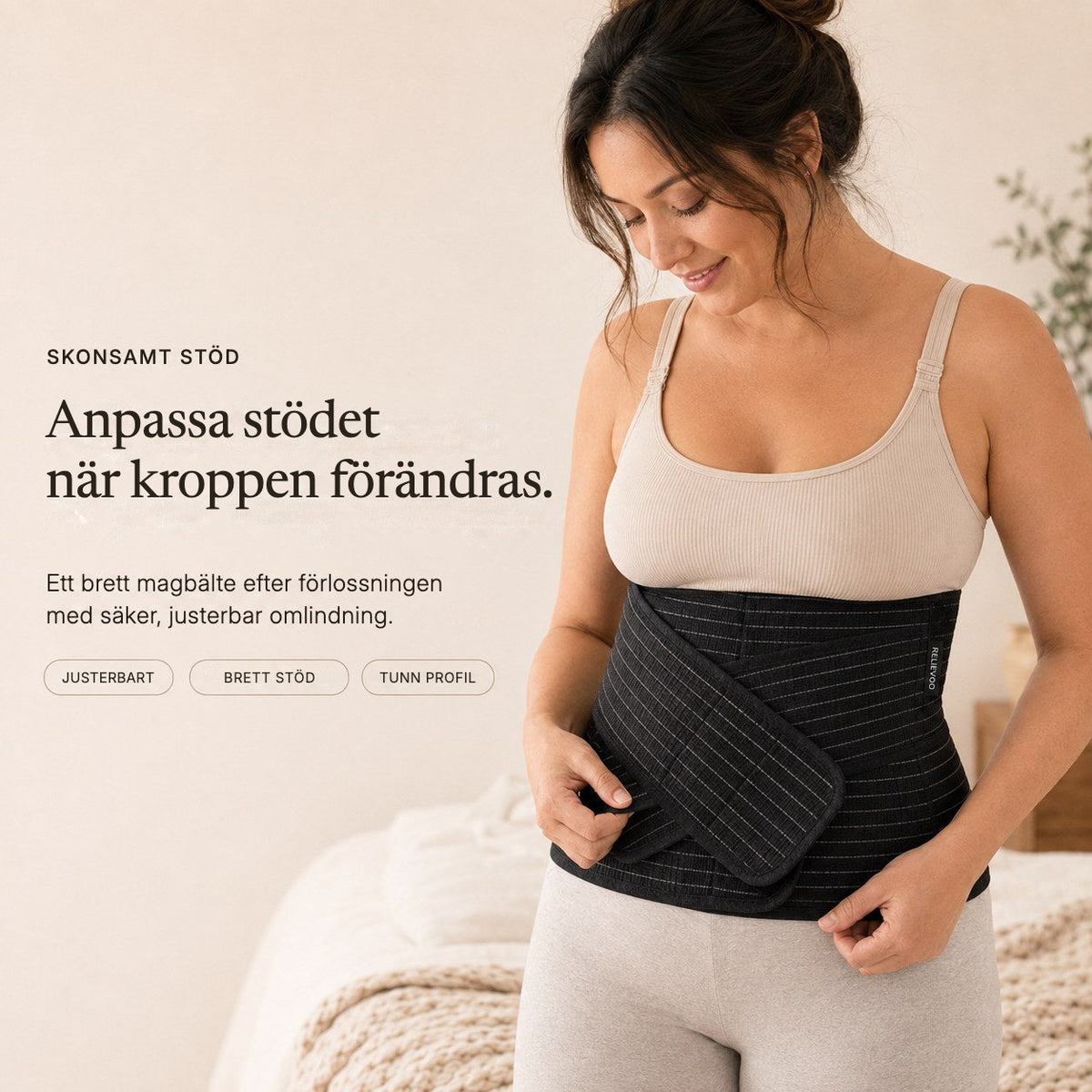 Woman adjusting the black Relievoo postpartum belly band from the complete recovery bundle rvpumpen rvhasar