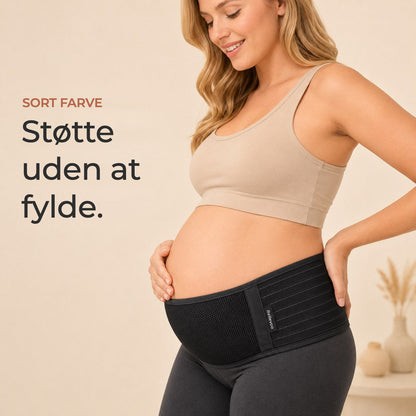 Pregnant woman wearing the black Relievoo pregnancy support belt under her bump rvpumpen rvhasar