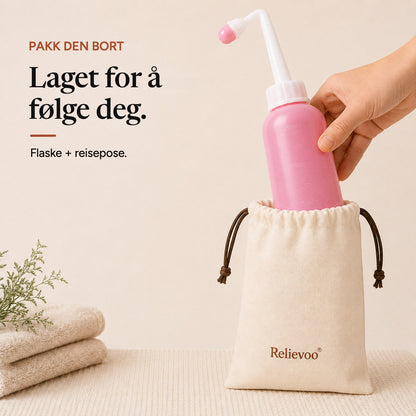Relievoo peri bottle being placed into its cotton drawstring travel pouch beside folded towels rvpumpen rvhasar